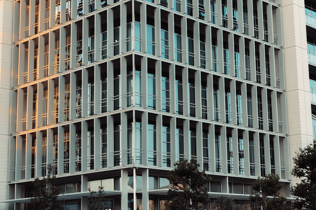 Highrise office building with reflective glass windows and modern design.